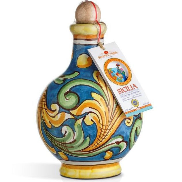 Decorative ceramic bottle with colorful patterns and a tag on a white background
