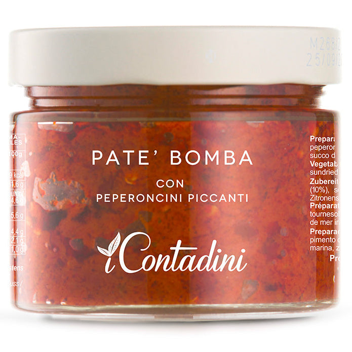 Jar of Pate' Bomba with spicy peppers on a white background