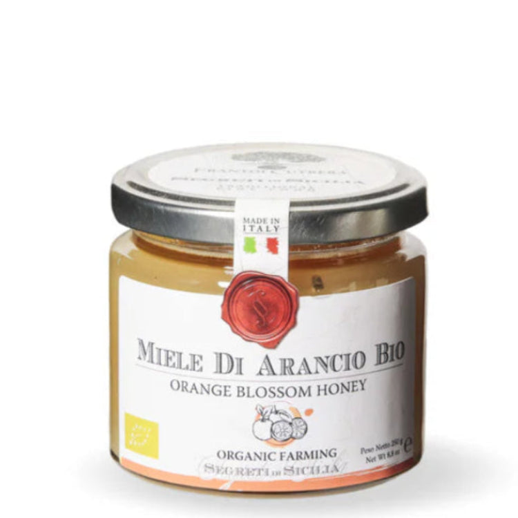 Jar of Miele Di Arancio Bio honey on a white background